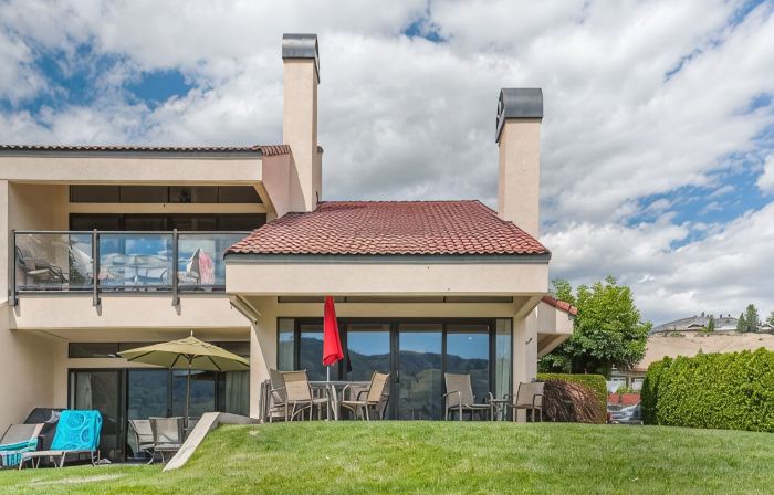 Luxury waterfront townhouse w/ sandy beach outside your patio door! WOW!