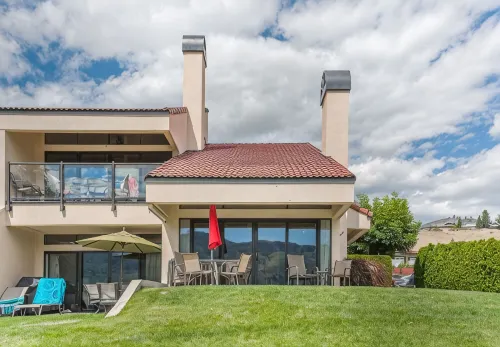 Luxury waterfront townhouse w/ sandy beach outside your patio door! WOW!