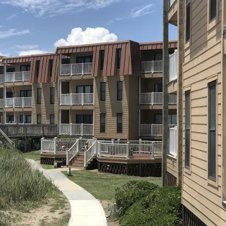 Enjoy an oceanfront getaway with beautiful beach steps from your door.