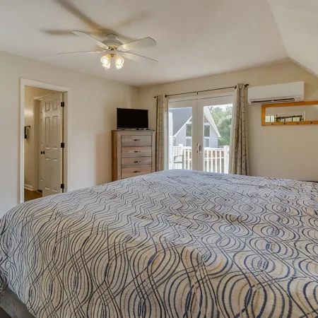 Lakehouse with covered dock, slide, and outdoor kitchen! Close to I-75, trails.