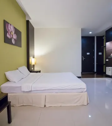 ห้องดีลักซ์ เตียงใหญ่ 1 เตียง