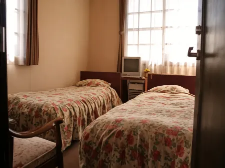 Auberge de la Luna Отели в г. Цумагои