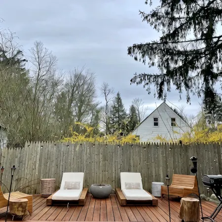 Cozy cabin with deck and fireplace steps from White Pond Lake. Dog friendly.