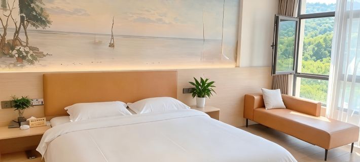 Junya Hotel (Jiaxing Pinghu Xincang Branch) Отели в г. Пинху