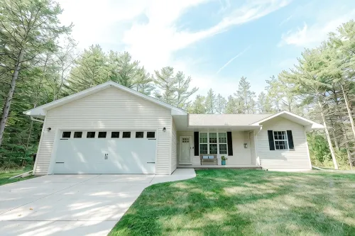 Private Wooded Retreat w/ Hot Tub & Fireplace - Walk to Coffee, Near Sister Bay