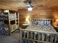 Stunning Sunrises from spacious Big Round Lake Cabin Hotels in Round Lake