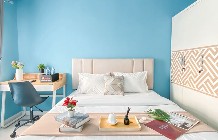Neat Studio with Blue Toned Wall at Dramaga Tower Apartment By Travelio
