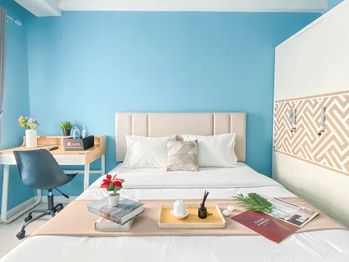 Neat Studio with Blue Toned Wall at Dramaga Tower Apartment By Travelio - 3-Star