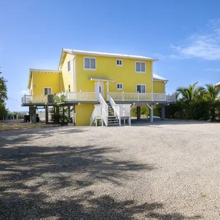 Direct Ocean View! 5 Bed/3 Bath with room for everyone. Large pool and Dock!