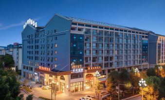 Vienna Hotel(Maitre Lake spring Township hot spring shop)
