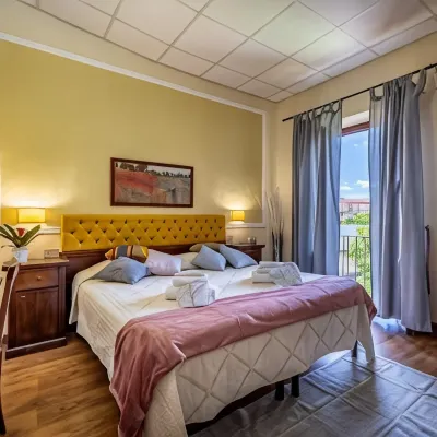 Hotel Minerva Отели рядом с достопримечательностью «Квартал Борго-Стретто»