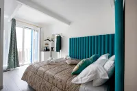 Cielo | Suite con Bagno e Cucina Condivisa – Centrale
