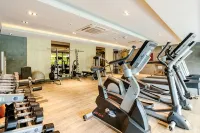 Baan Mai Khao, Luxury Beachfront Duplex 2 BR Residence - 健身室/gym room