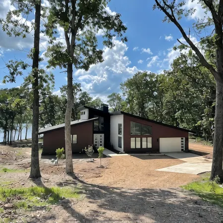 Stunning lake front new construction home in the heart of drowning creek.