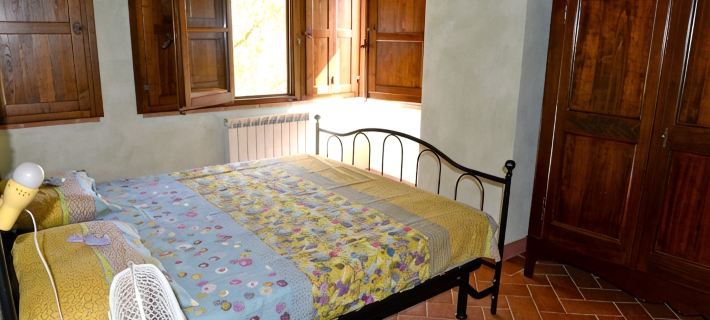 Casa di charme in a casolare di pietra con giardino privato Hotels in Asciano