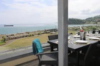 Beachfront Penthouse Apartment with Wrap-Around Balconies and Panoramic Sea Views