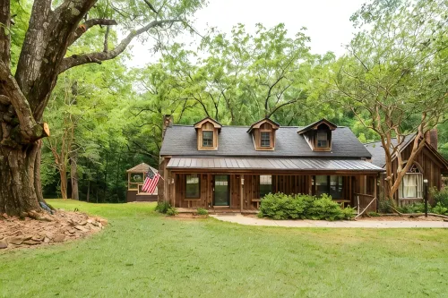 Vintage charm meets modern comfort in this historic 1850s cabin at Lake Hartwell