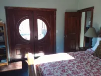 Catalpa Cottage is named after the giant Catalpa trees surrounding the cottage ~