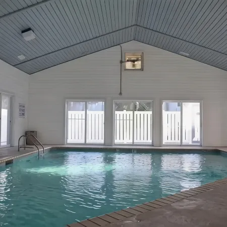 Extra large first floor condo with indoor & outdoor pools, close to the beach.