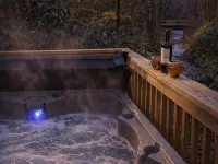 Steps to Elk River! Cozy Cabin w/ Hot Tub & Bunk Room Hotels in Avery County