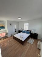 Relax with family or friends to this elegant apartment in the heart of Waltham