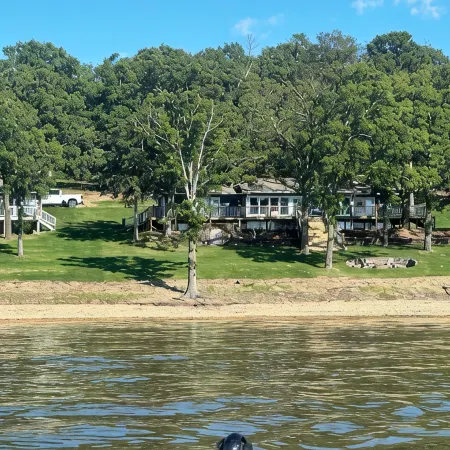 Waterfront with Private dock w/ amazing views, fire pit and pet friendly!