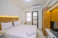 Comfortable and Cozy Studio Room at Transpark Cibubur Apartment - parkir