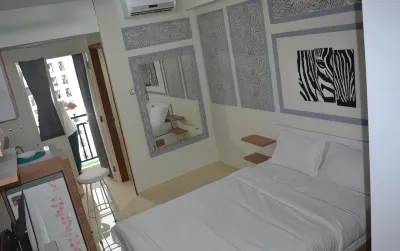 RedLiving Apartemen Green Lake View Ciputat - Juragan Rooms Tower B with Fast Wifi Hotel dekat Ramayana Ciputat