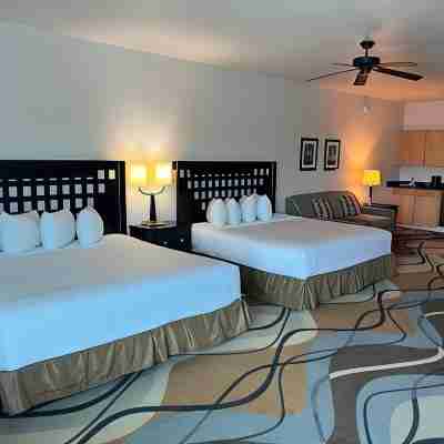 Sunchase Inn & Suites Rooms