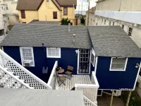 Stand-alone cottage, ocean view, seconds to beach, and short walk to downtown!
