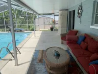 CAPTAIN’S QUARTERS Tropical pool house. Airport, Beaches, Usssa sports complex - ติดทะเล
