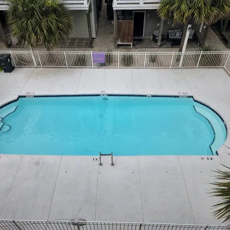 Coastal Comfort: 4-bedroom house with pool and sound access, 3 min walk to beach