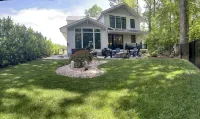 Custom 4-Bedroom Home w/Boat Slip, Private Fenced Backyard & Swimming Pool.