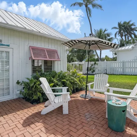 The Historic Coquina Cottages C is 2 Blocks to the Beach, 5th Avenue and 3rd St.