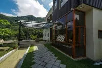 Xi Tou in Sunny Day Inn Hotel in zona Wv Siv Farm