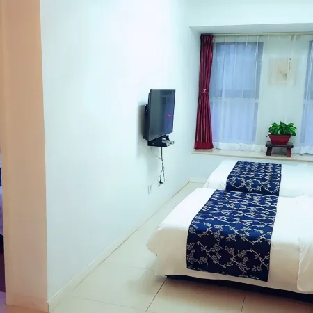 Guan County Hong Pu Traders Hotel