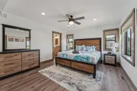 Modern 6BR Lakefront Escape • Private Beach • Sleeps 20 • Pets+ • Dells 30min
