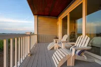 Luxury Waterfront Retreat with Stunning Views & Golf Cart - Gym