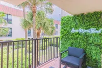 Breezy Beachside Property: Beach Views, Heated Pool, Pickleball & Kid Friendly! - balcony