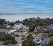 Updated beach house with private pool, hot tub, and community fitness center!