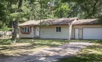 Torch Lake 4 bedroom home w/ large yard & parking