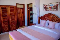 4-bedroom villa in enchanting Pazuri in Kilifi County with AC, WiFi - วิลล่า