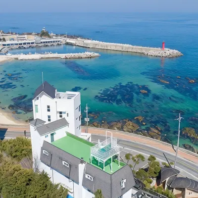 M9 Spa and Ocean View Pension Отели рядом с достопримечательностью «Библиотека «Сунджу»»