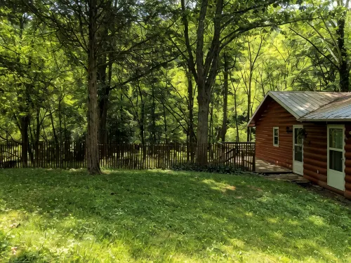 Our creekside cabin is nestled deep in the country on a secluded lane. - 3-Star