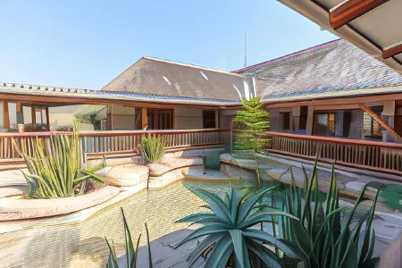 Rain Farm Game Lodge Отели в г. Илембе