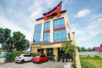Super OYO 90565 Wesly House Hôtels à : Sei Sikambing D
