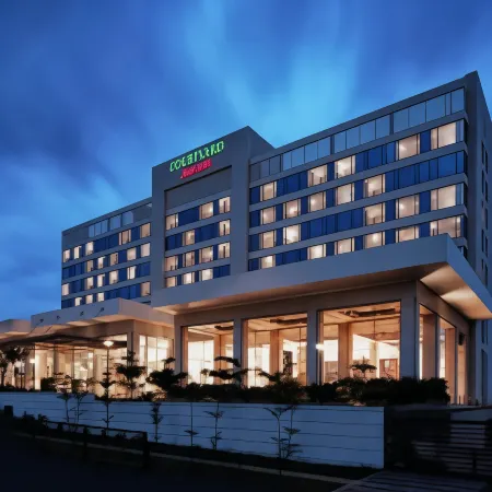 Courtyard Pune Chakan Отели в г. Бгамболи