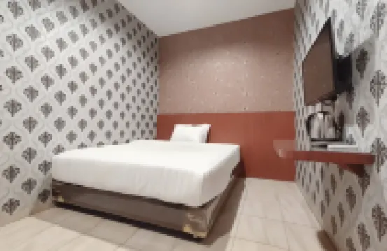 RedDoorz Plus @ Jalan Letda Sujono Medan 2 Hotels near Lapangan Serbaguna Unimed