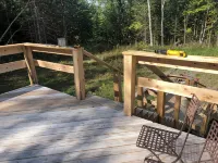 Charming cabin in wonderful New Sweden with 80 acres of woods and trails - Feriehus
