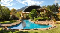 Tree Tops Apt @ Dreamers features log fire, mountain + pool views thru tree tops - Apartments